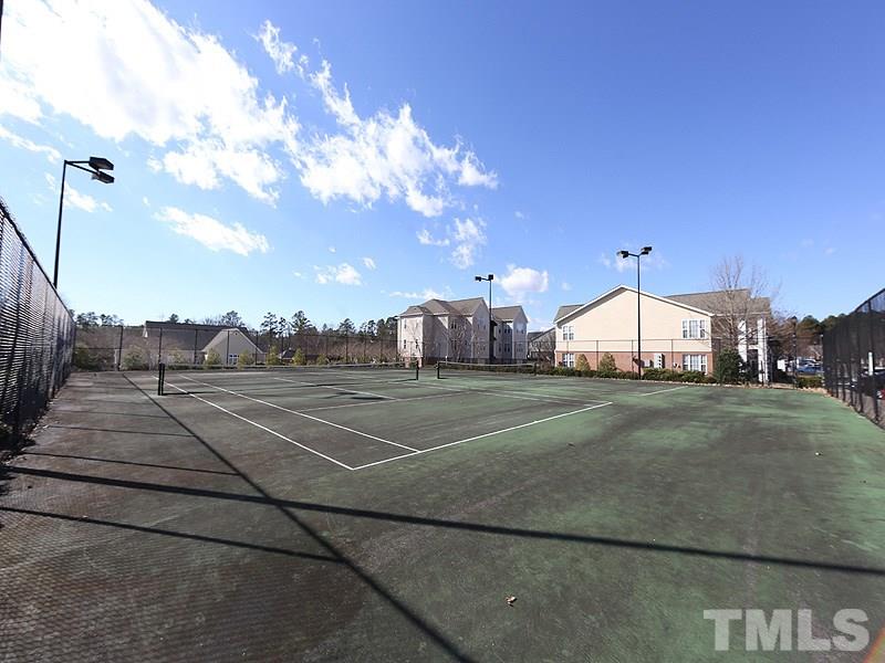 11370 Involute Place, Unit 105 Raleigh, NC 27617 - Photo 13 of 15 a view of a tennis court