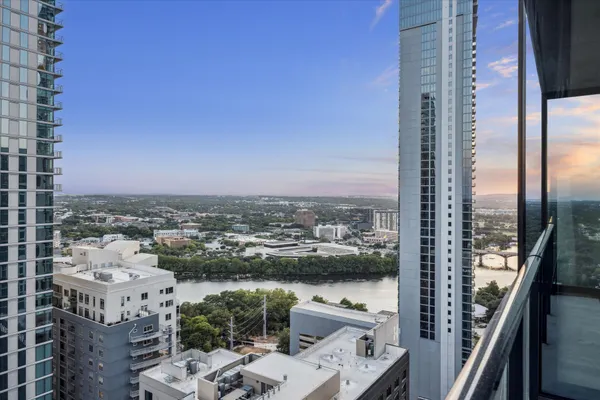 a view of a balcony with city view