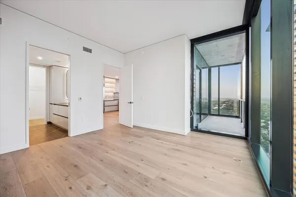 a view of a room with a closet area