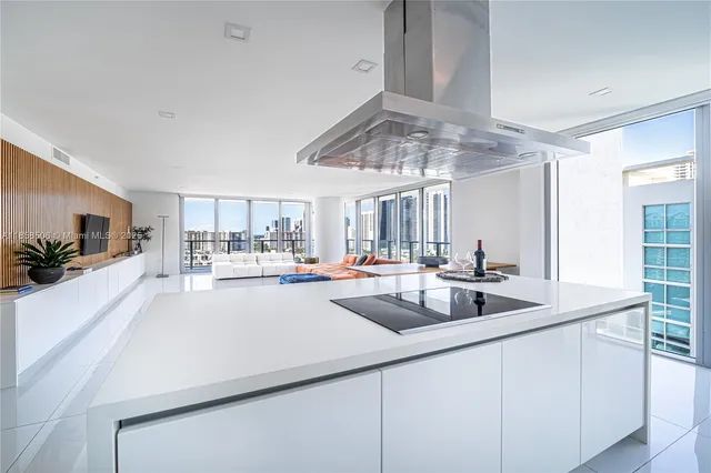 a kitchen with sink cabinets and window