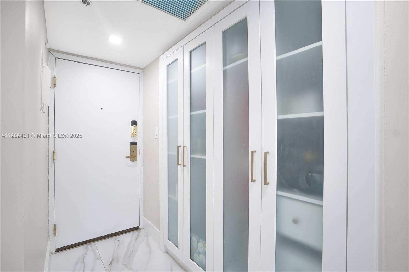 5225 Collins Avenue, Unit 1403 Miami Beach, FL 33140 - Photo 15 of 21 a view of elevator