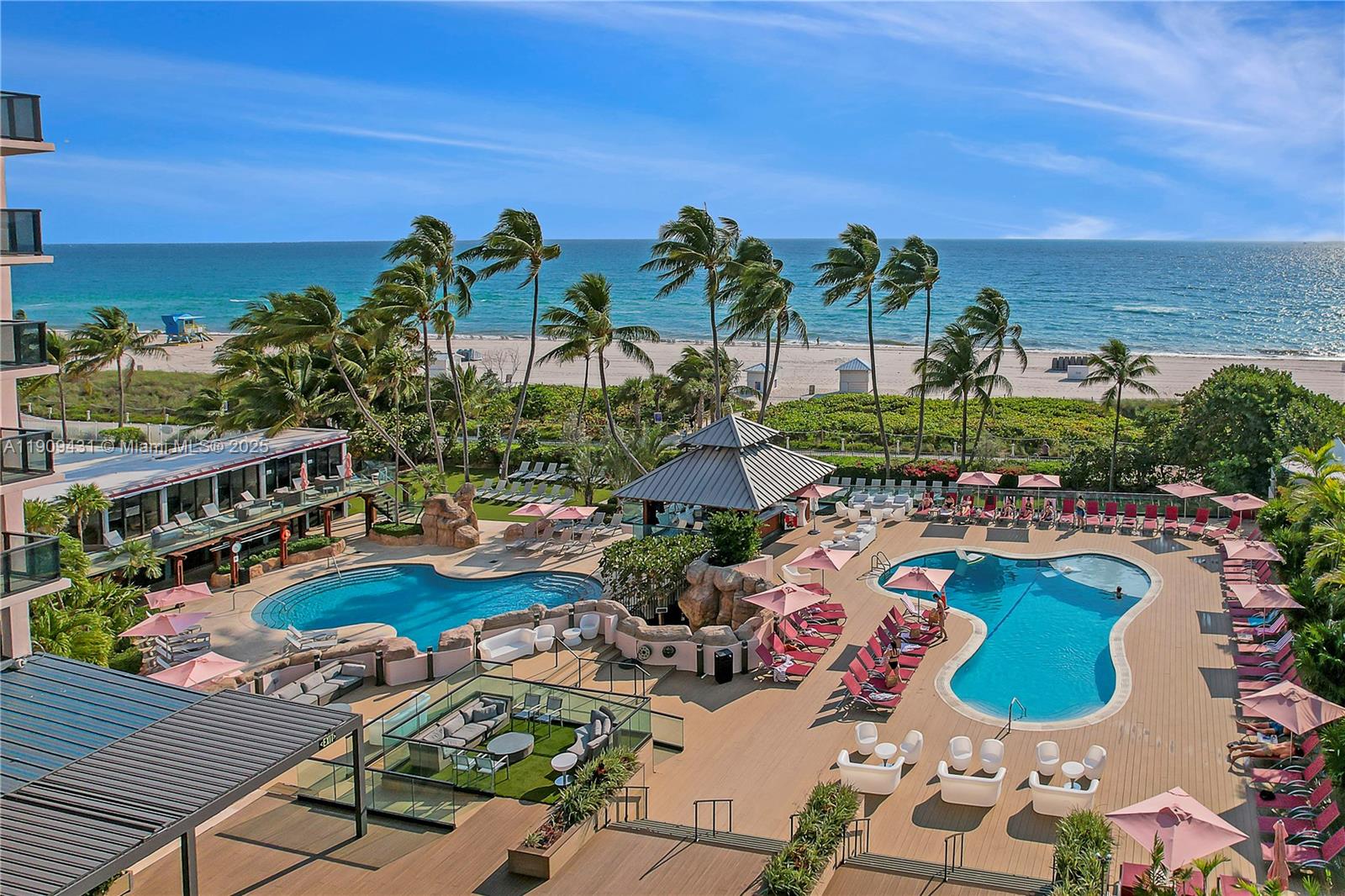 5225 Collins Avenue, Unit 1403 Miami Beach, FL 33140 - Photo 17 of 21 a view of swimming pool with outdoor seating