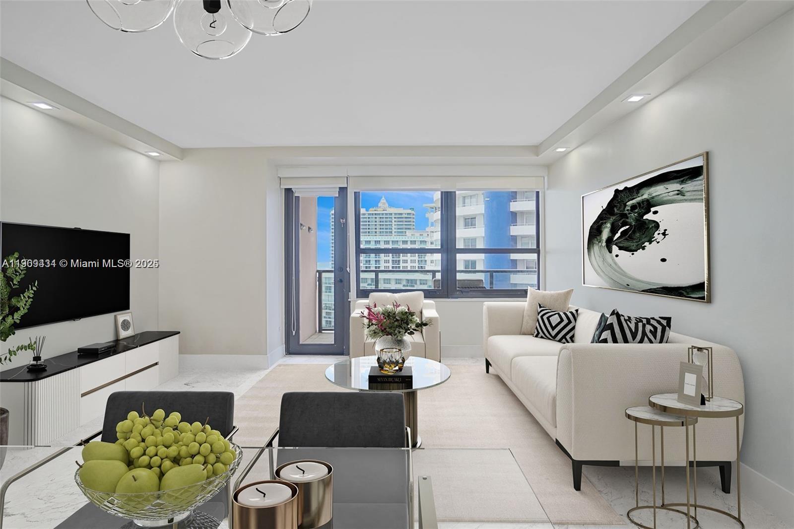 5225 Collins Avenue, Unit 1403 Miami Beach, FL 33140 - Photo 3 of 21 a living room with furniture and a flat screen tv