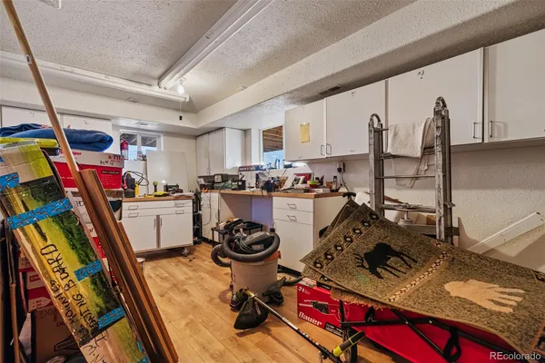 a room with furniture and a wooden floor