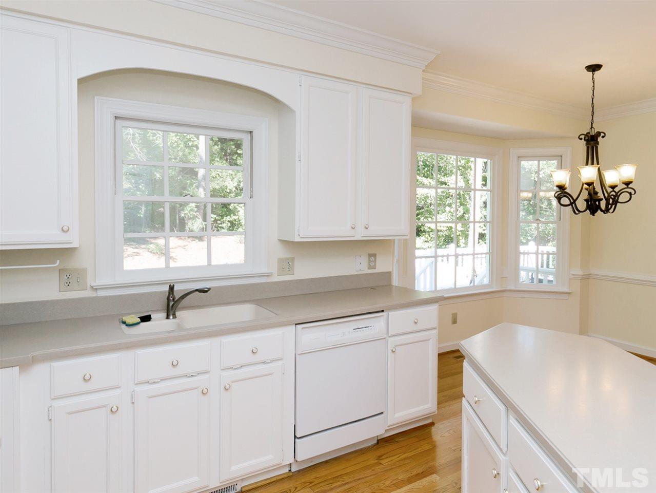 1312 Binley Place Raleigh, NC 27615 - Photo 5 of 22 a kitchen with sink and window