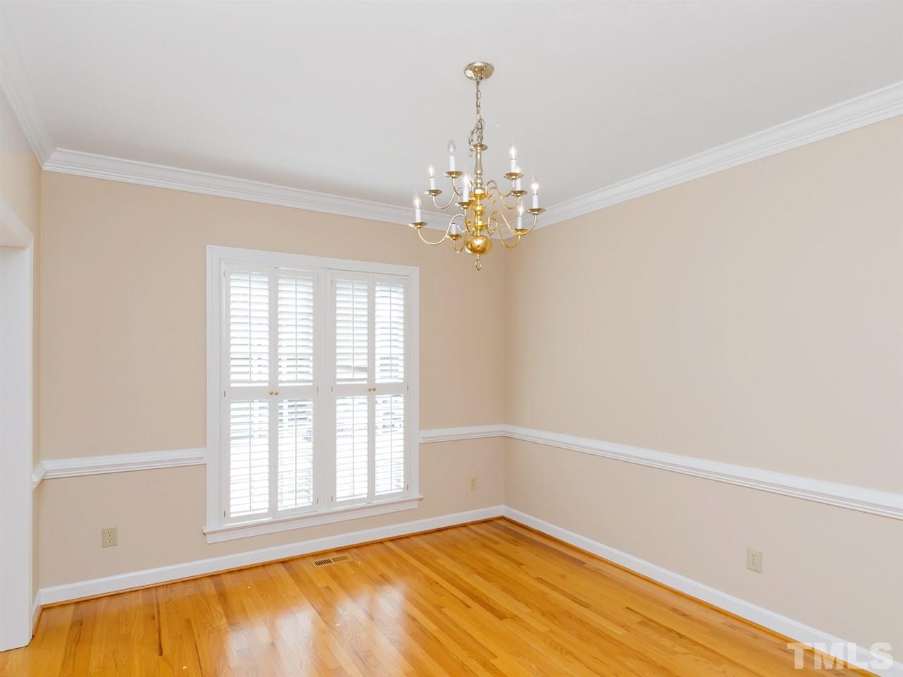 1312 Binley Place Raleigh, NC 27615 - Photo 8 of 22 a view of an empty room with a window