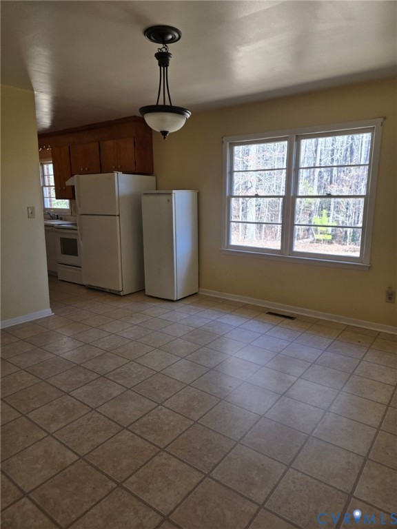 19247 Courthouse Road Yale, VA 23897 - Photo 3 of 14 a living room with a window and a table