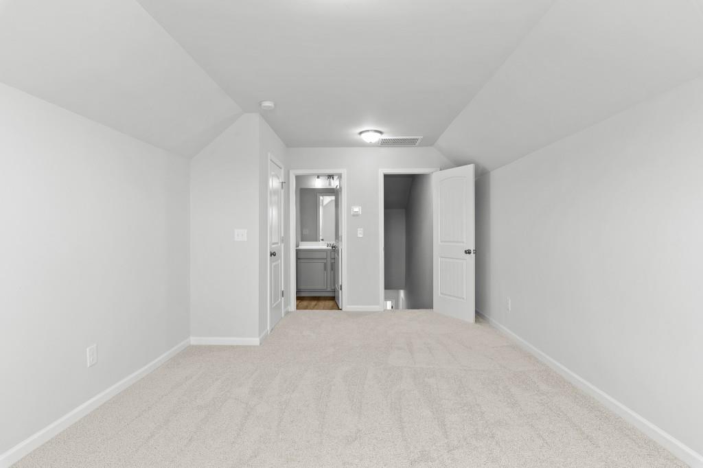 154 Greenview Court Homer, GA 30547 - Photo 34 of 44 a view of a hallway with wooden shelves