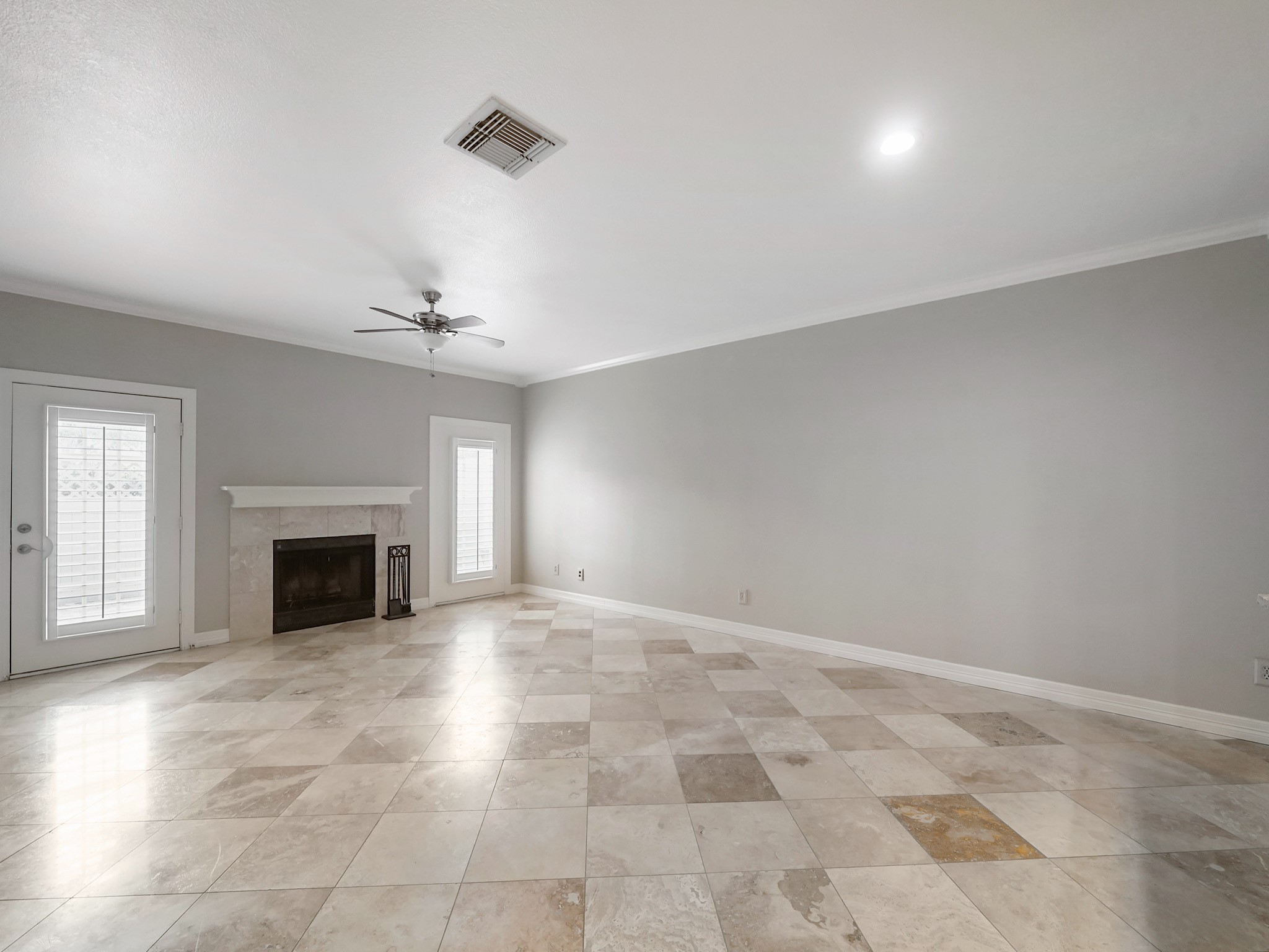 6000 Reims Road, Unit 2205 Houston, TX 77036 - Photo 6 of 35 Airy, elegant living and dining area ideal for gatherings.