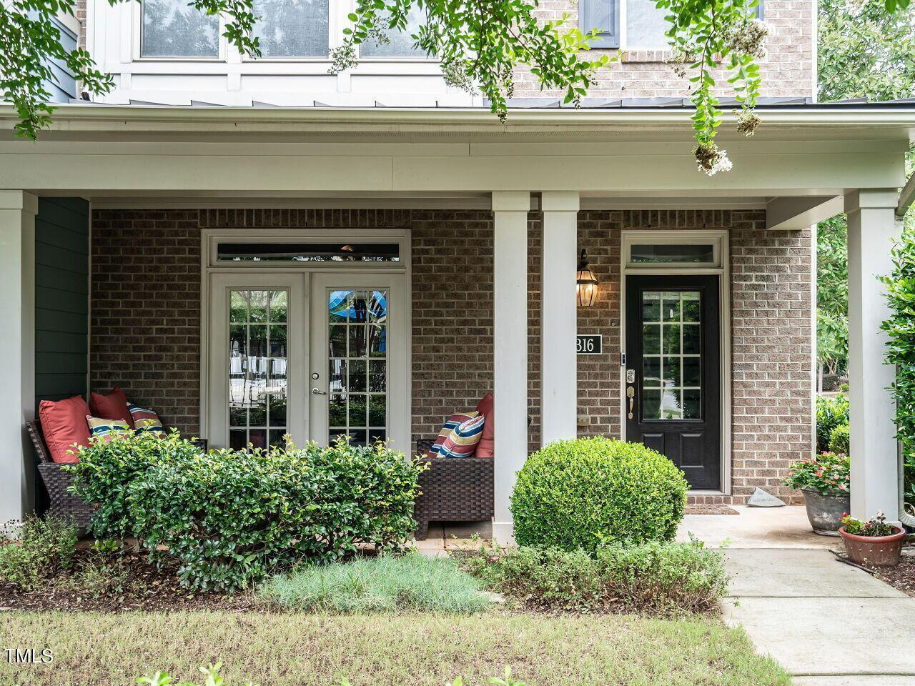 1316 Cornell Place Raleigh, NC 27607 - Photo 2 of 31 a front view of a house with garden