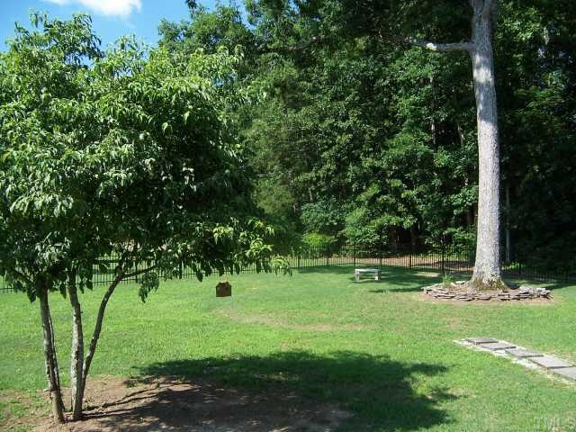 2431 Flat River Church Road Roxboro, NC 27574 - Photo 12 of 12 a big yard with lots of green space and trees