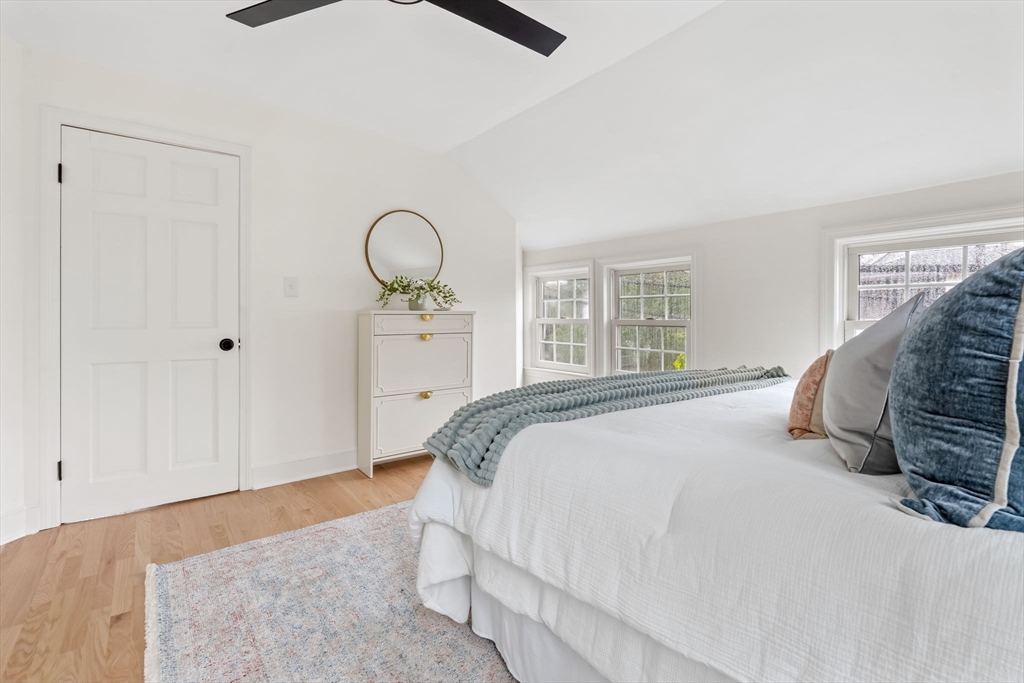 108 Warren Street Arlington, MA 02474 - Photo 26 of 42 a bedroom with a bed and a window