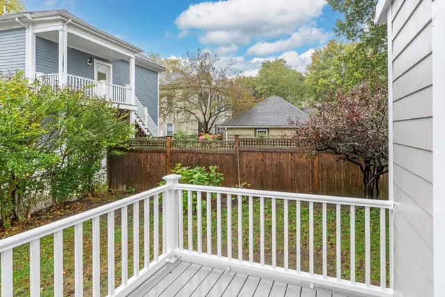 a view of a wooden fence