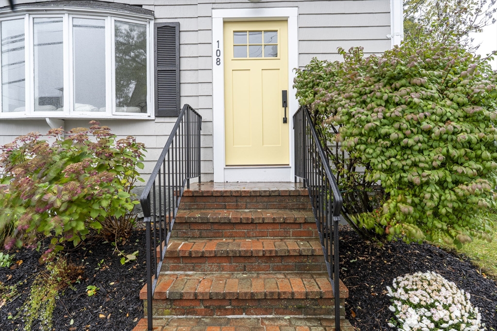 108 Warren Street Arlington, MA 02474 - Photo 42 of 42 a view of a house with potted plants