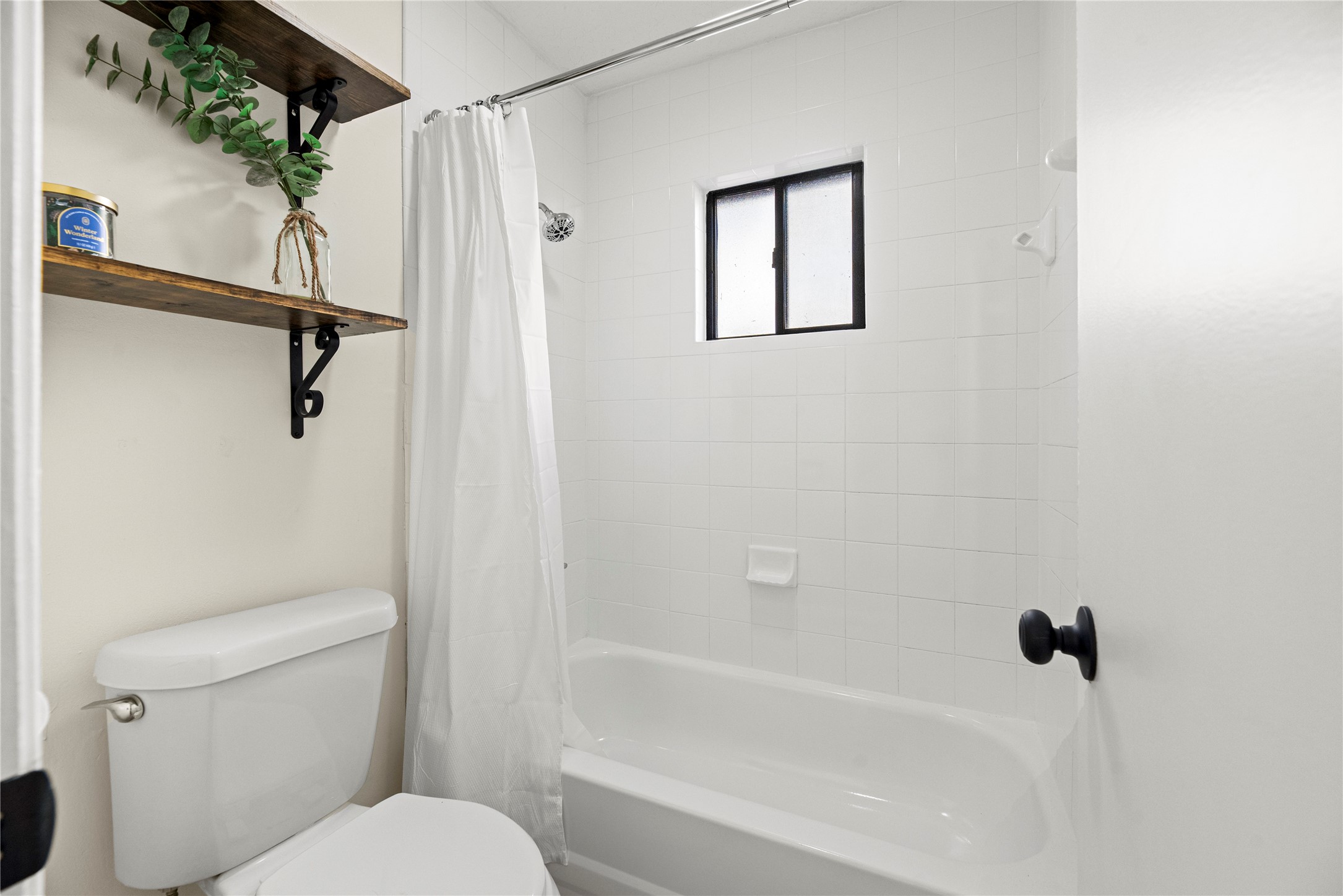 3519 Acorn Way Lane Spring, TX 77389 - Photo 8 of 15 a white toilet sitting next to a bath tub