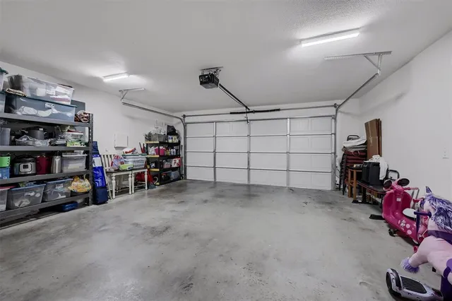 a view of a garage with storage