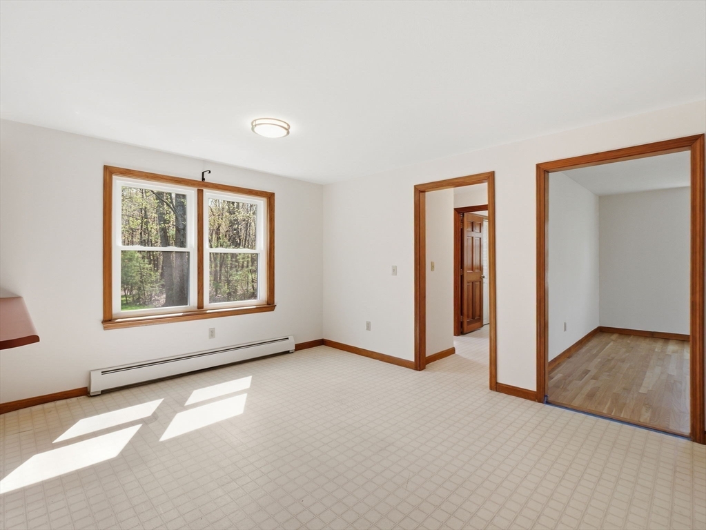 26 Nevada Road Tyngsborough, MA 01879 - Photo 12 of 42 an empty room with windows and closet