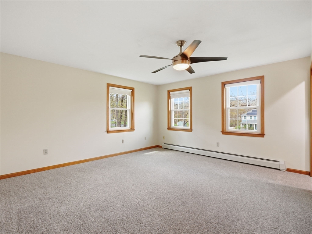 26 Nevada Road Tyngsborough, MA 01879 - Photo 26 of 42 a view of an empty room with a window