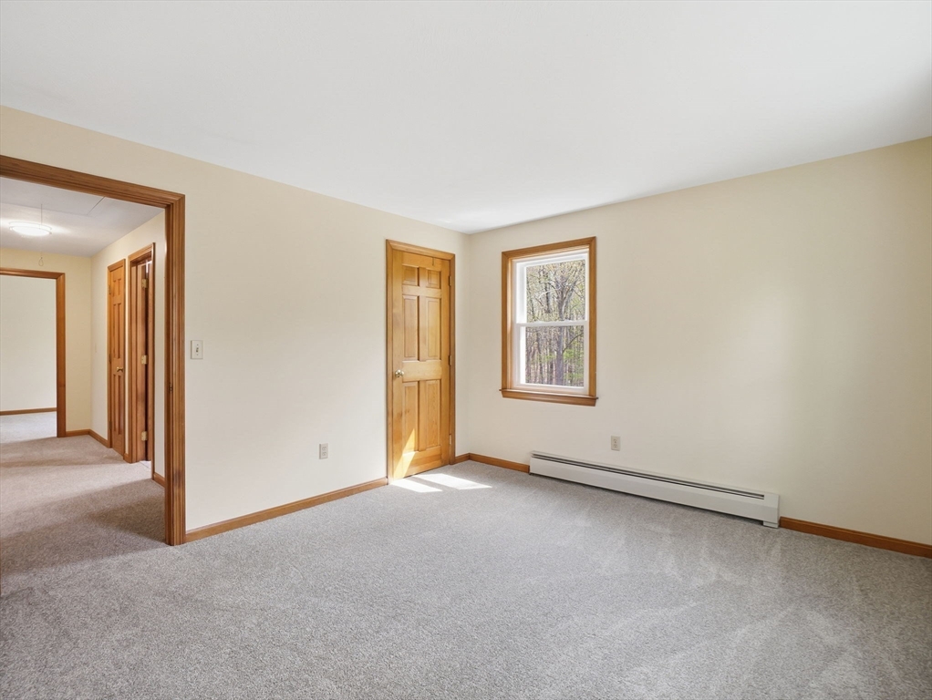 26 Nevada Road Tyngsborough, MA 01879 - Photo 31 of 42 an empty room with windows