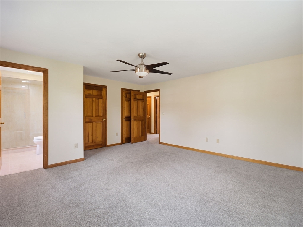 26 Nevada Road Tyngsborough, MA 01879 - Photo 33 of 42 a view of an empty room with a ceiling fan
