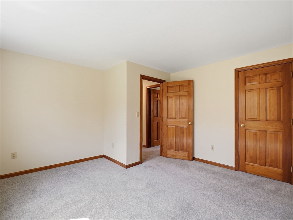 26 Nevada Road Tyngsborough, MA 01879 - Photo 36 of 42 an empty room with closet area
