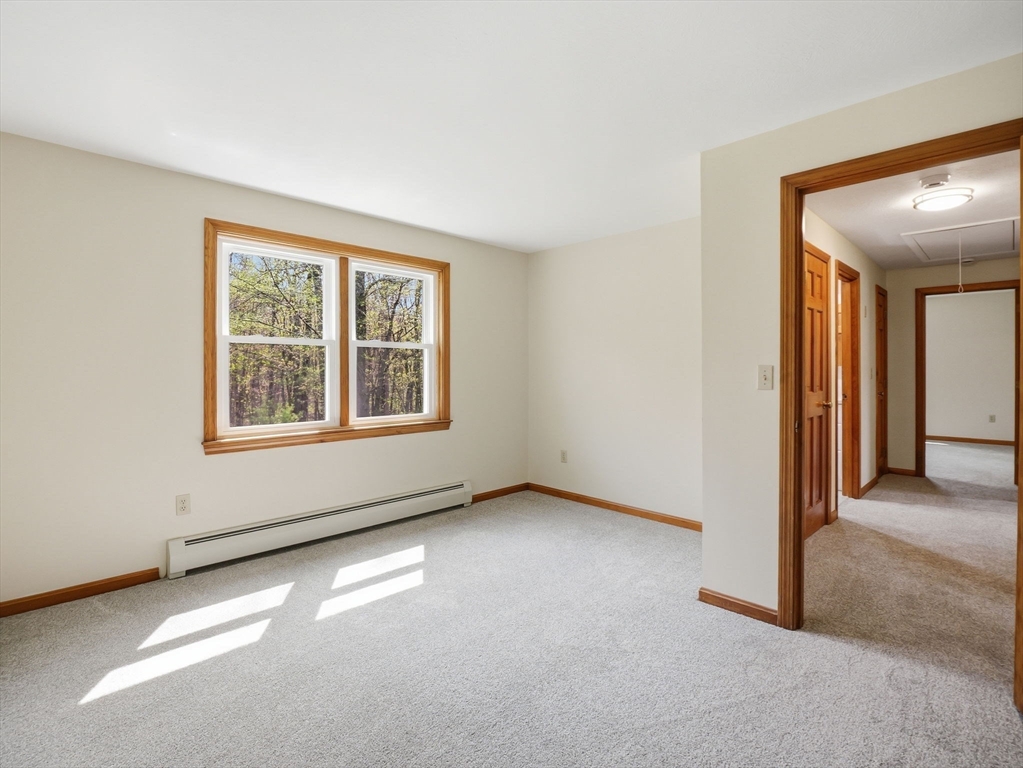 26 Nevada Road Tyngsborough, MA 01879 - Photo 37 of 42 an empty room with windows