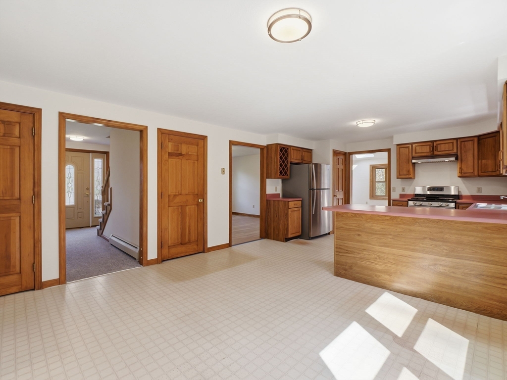 26 Nevada Road Tyngsborough, MA 01879 - Photo 4 of 42 a view of kitchen and a window