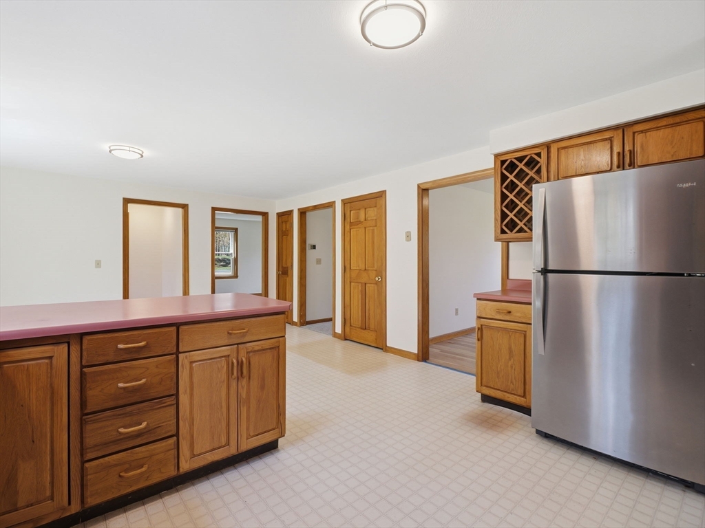 26 Nevada Road Tyngsborough, MA 01879 - Photo 9 of 42 a spacious bathroom with a double vanity sink and a mirror
