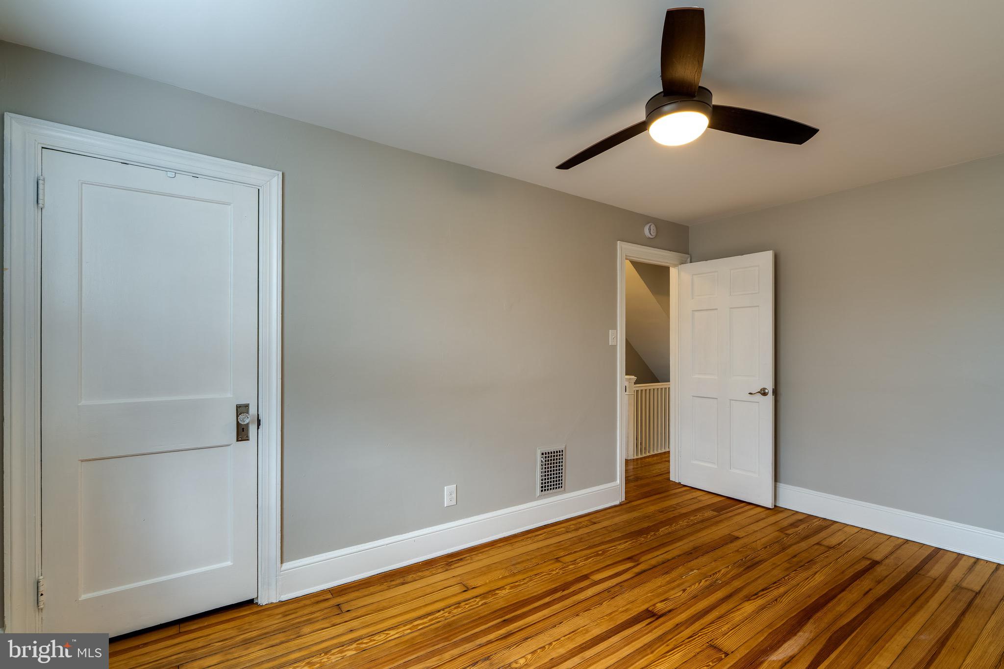 679 Poplar Street Lancaster, PA 17603 - Photo 17 of 32 a view of empty room with wooden floor