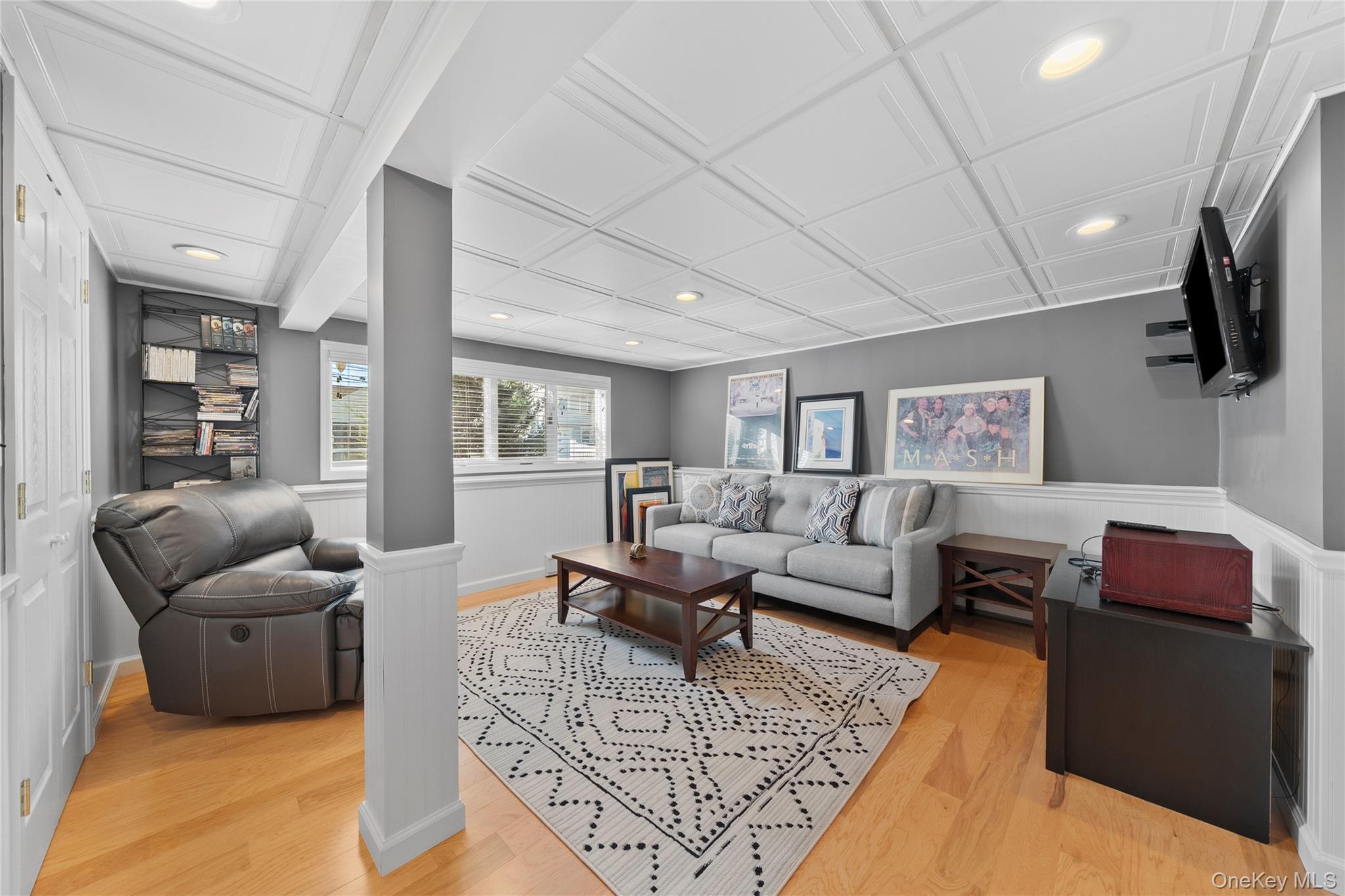 15 Hayes Road Amity Harbor, NY 11701 - Photo 12 of 46 a living room with furniture or couch and a wooden floor