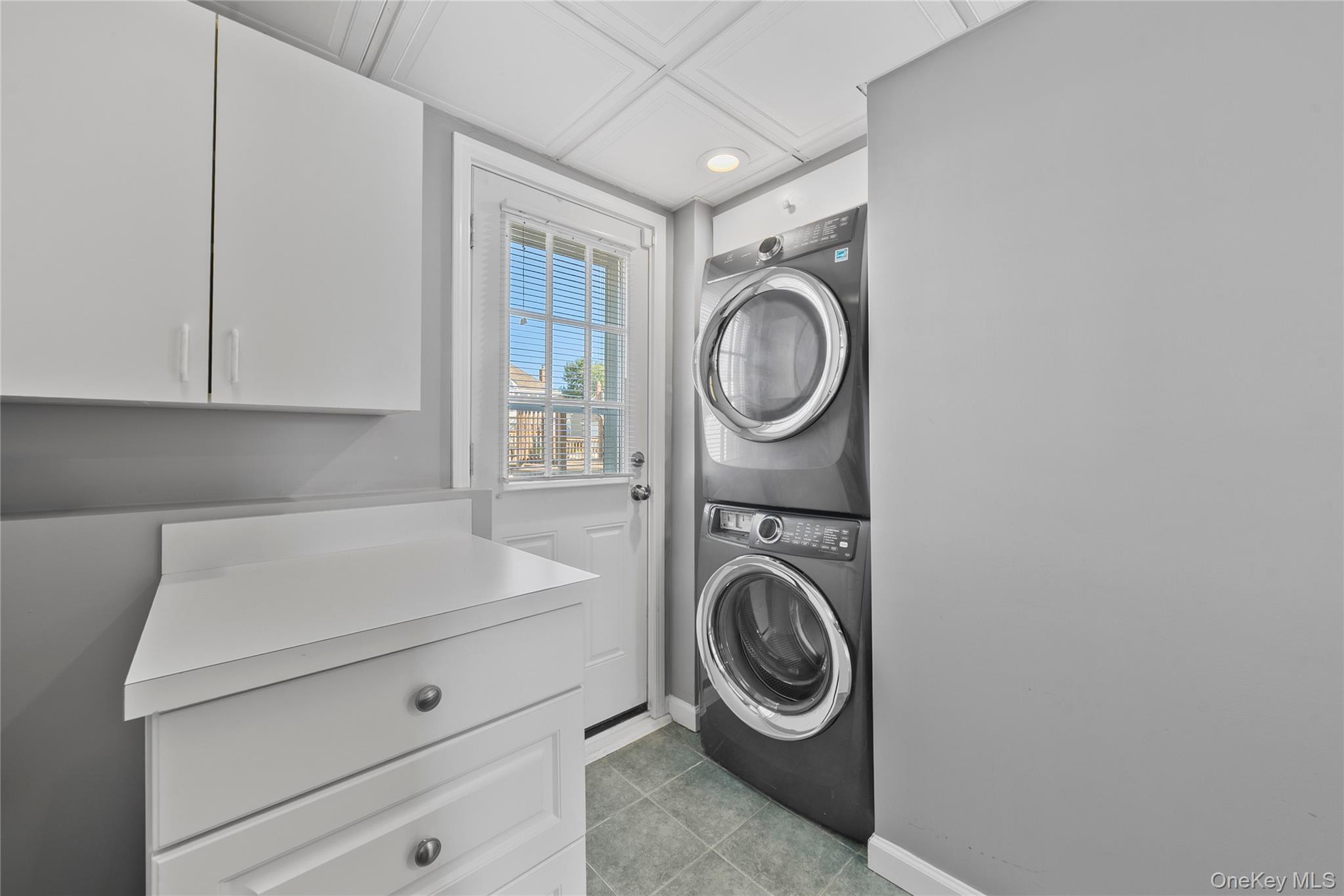 15 Hayes Road Amity Harbor, NY 11701 - Photo 14 of 46 a utility room with sink dryer and washer