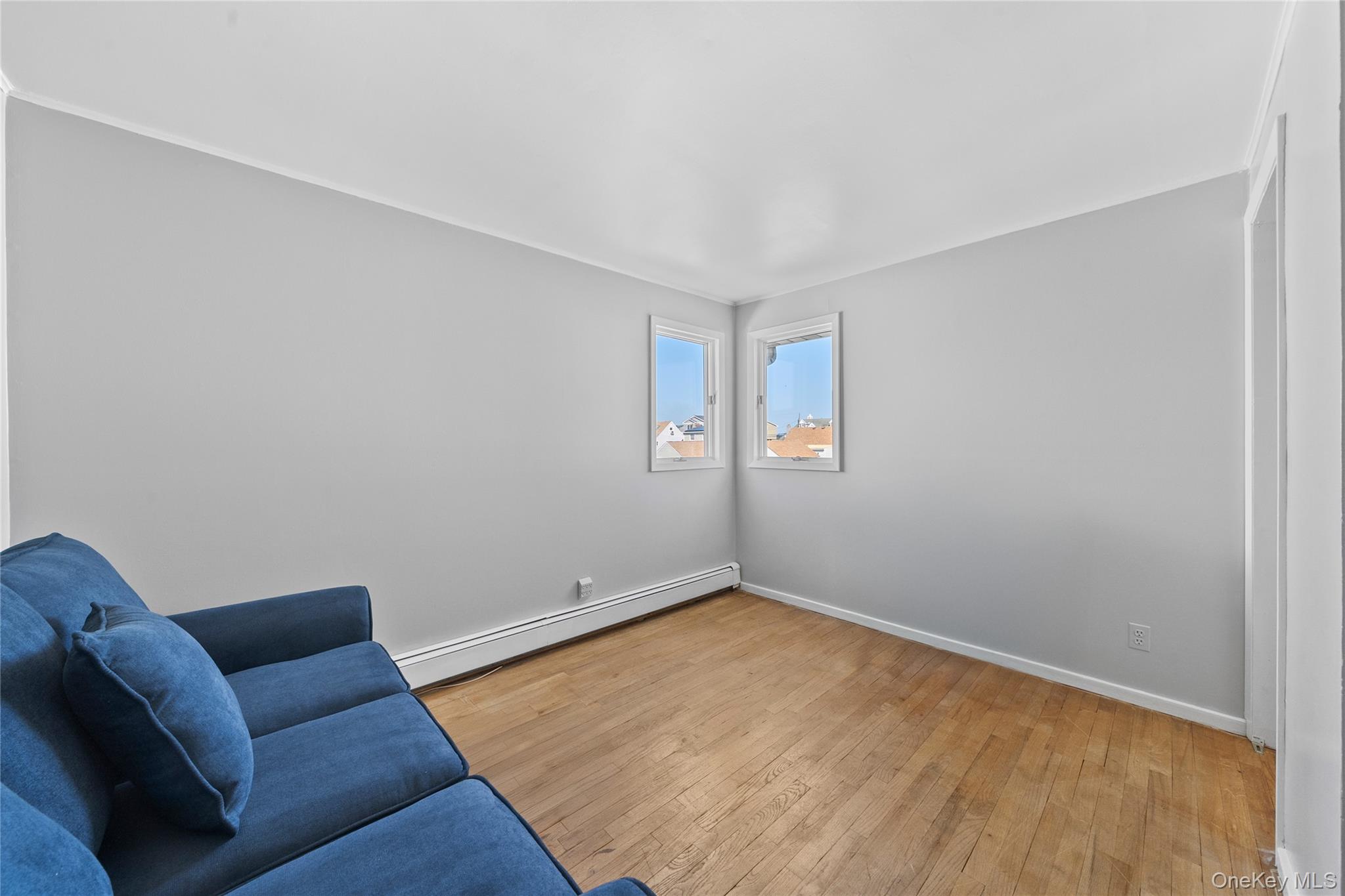 15 Hayes Road Amity Harbor, NY 11701 - Photo 17 of 46 a view of room with a couch