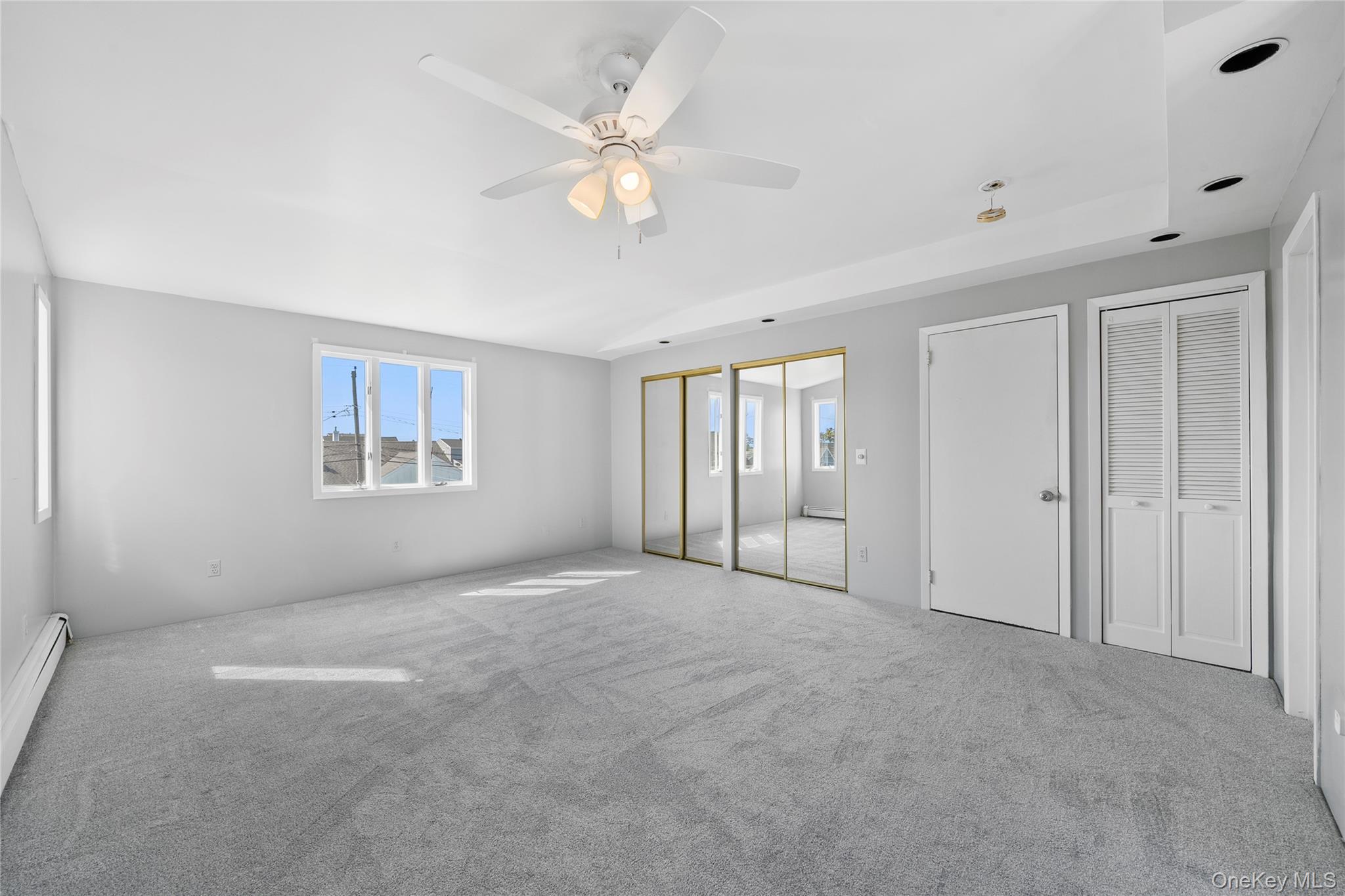 15 Hayes Road Amity Harbor, NY 11701 - Photo 21 of 46 a view of an empty room with a window