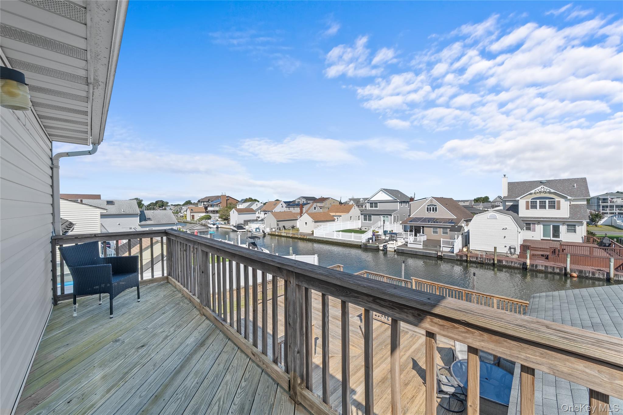 15 Hayes Road Amity Harbor, NY 11701 - Photo 24 of 46 a view of city from a balcony