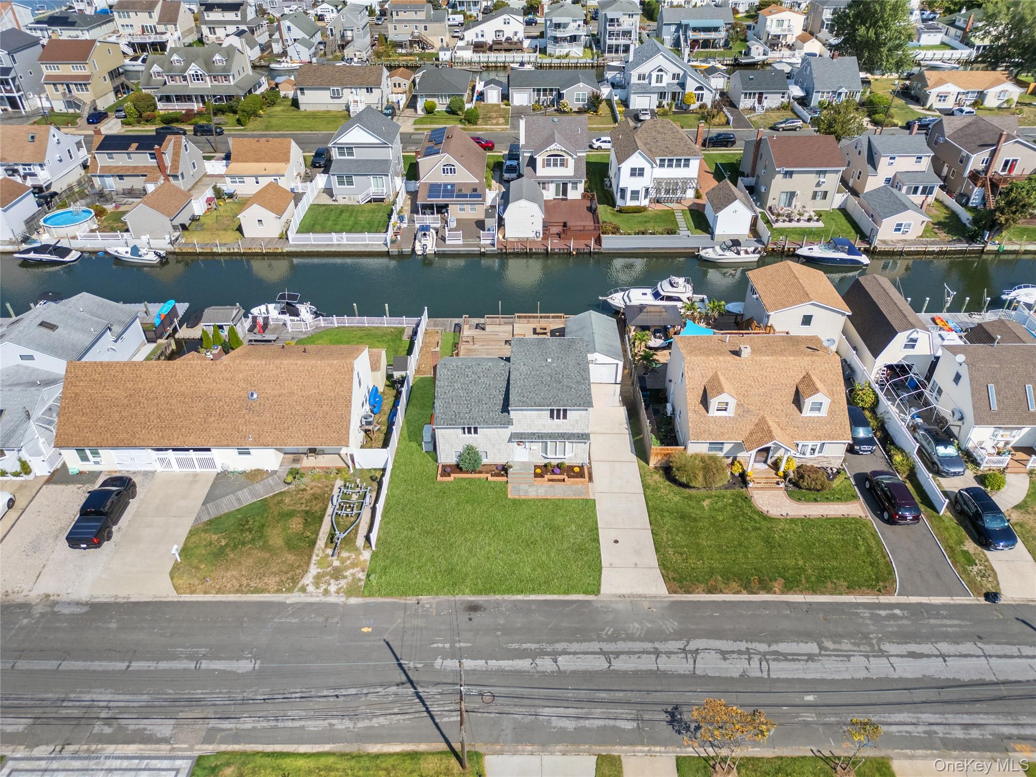 15 Hayes Road Amity Harbor, NY 11701 - Photo 26 of 46 an aerial view of residential houses with outdoor space