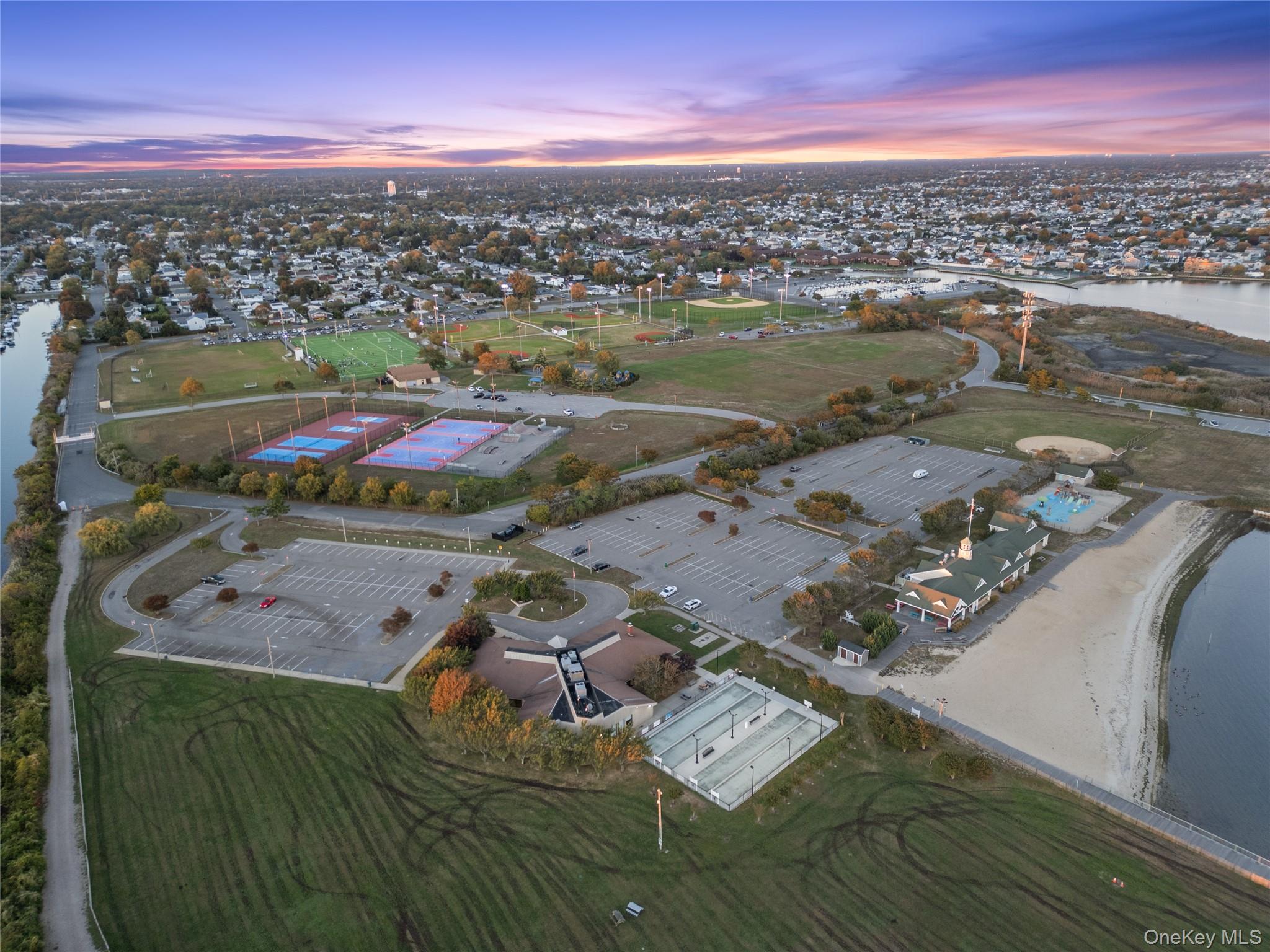 15 Hayes Road Amity Harbor, NY 11701 - Photo 32 of 46 an aerial view of residential houses with outdoor space