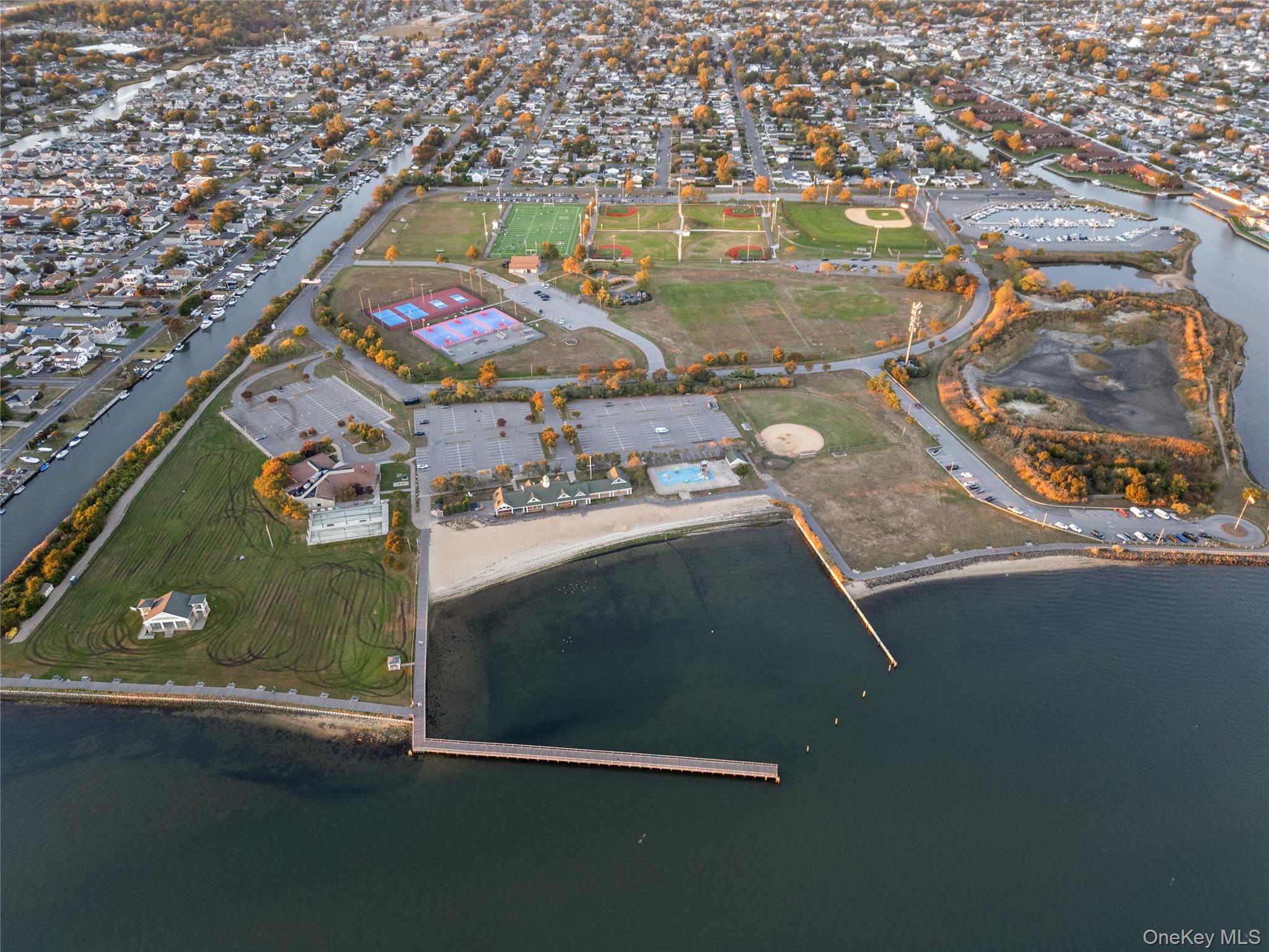 15 Hayes Road Amity Harbor, NY 11701 - Photo 34 of 46 an aerial view of residential houses with outdoor space