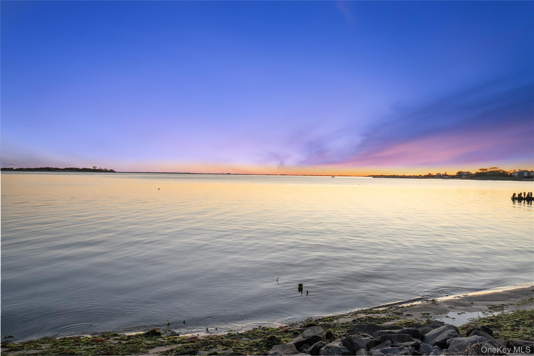 15 Hayes Road Amity Harbor, NY 11701 - Photo 42 of 46 a view of an ocean