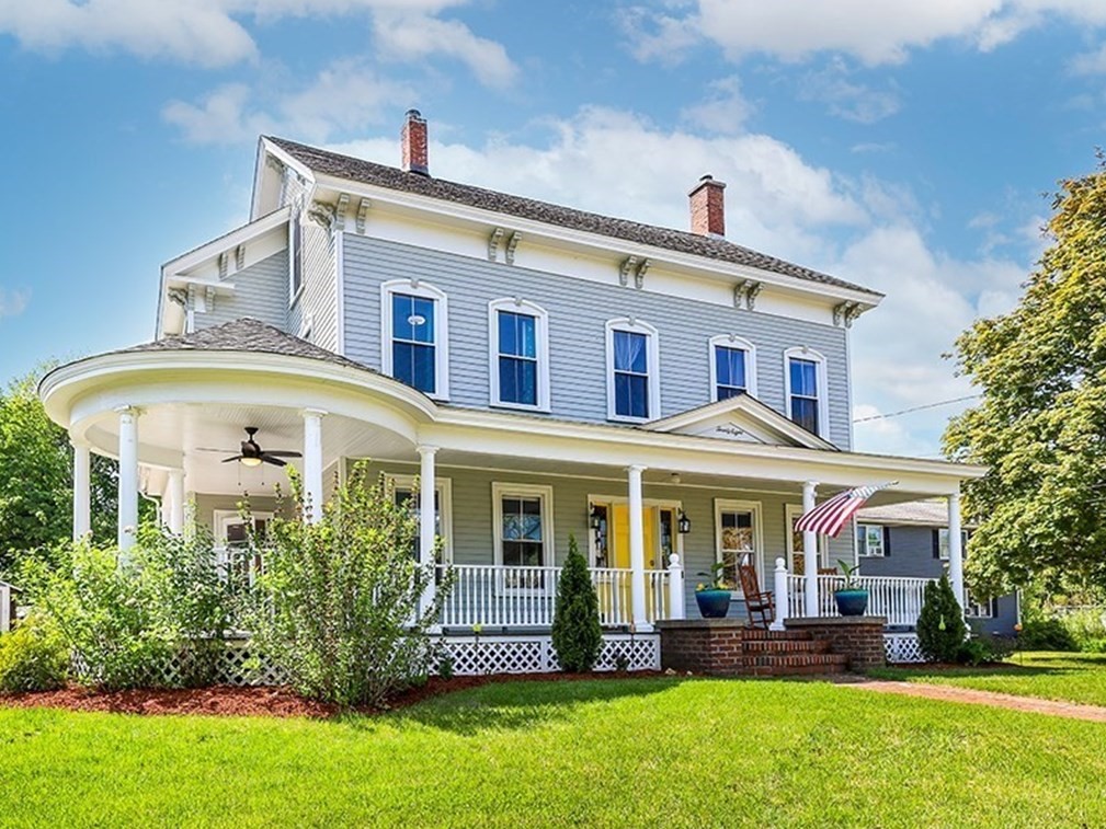28 Maple Street Mendon, MA 01756 - Photo 1 of 39 front view of a brick building with a yard