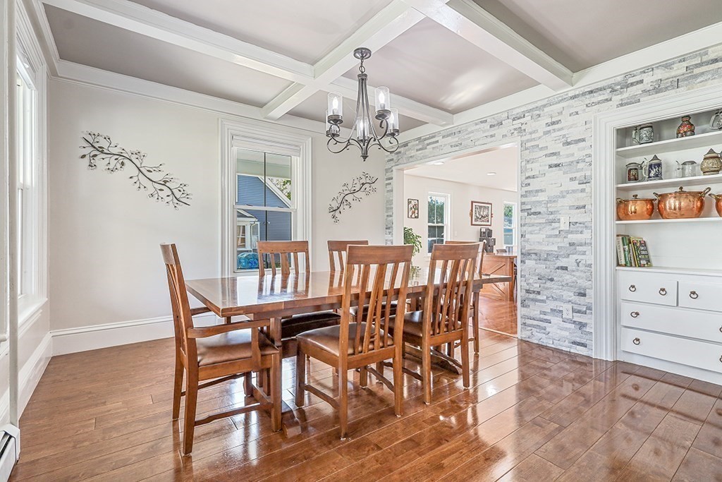 28 Maple Street Mendon, MA 01756 - Photo 13 of 39 a view of a dining room with furniture window and wooden floor