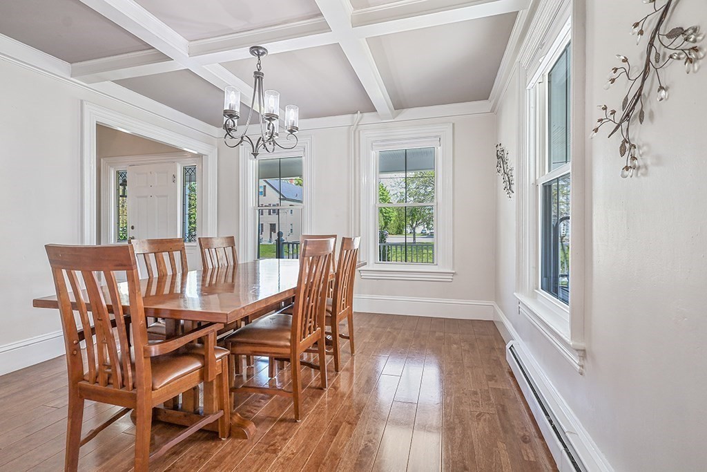 28 Maple Street Mendon, MA 01756 - Photo 15 of 39 a view of a dining room with furniture window and wooden floor