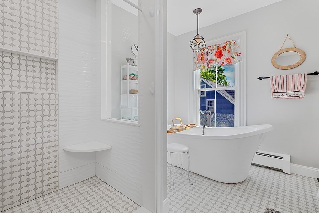 28 Maple Street Mendon, MA 01756 - Photo 27 of 39 a very nice looking dining room with a sink and cabinets
