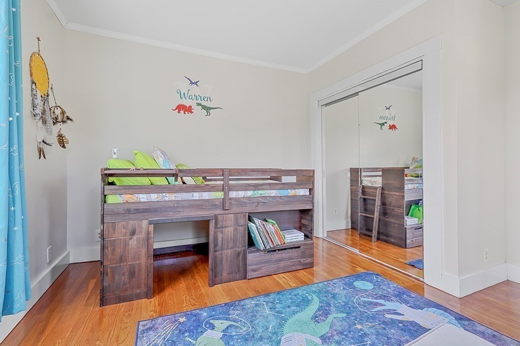 28 Maple Street Mendon, MA 01756 - Photo 30 of 39 a living room with furniture and a fireplace