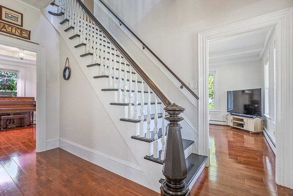 28 Maple Street Mendon, MA 01756 - Photo 5 of 39 a view of entryway and hall with wooden floor
