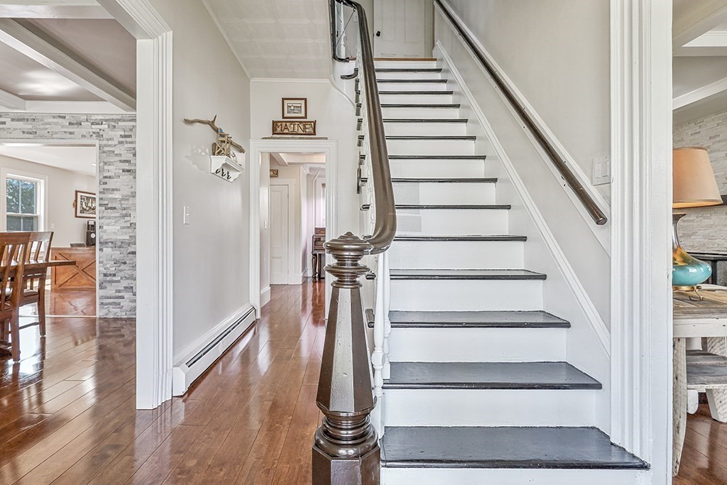 28 Maple Street Mendon, MA 01756 - Photo 6 of 39 a view of entryway and hall with wooden floor