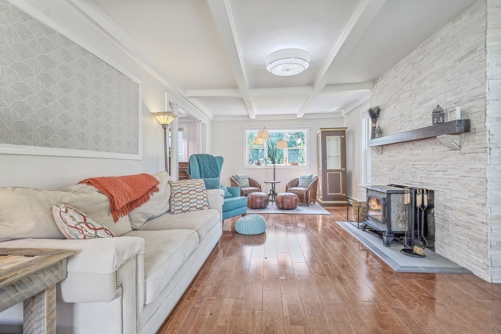 28 Maple Street Mendon, MA 01756 - Photo 9 of 39 a living room with fireplace furniture and a fireplace