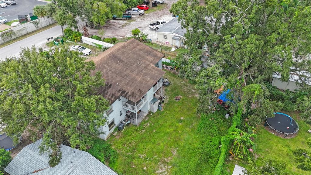 1806 East 138th Avenue Tampa, FL 33613 - Photo 17 of 19 a aerial view of a house with yard