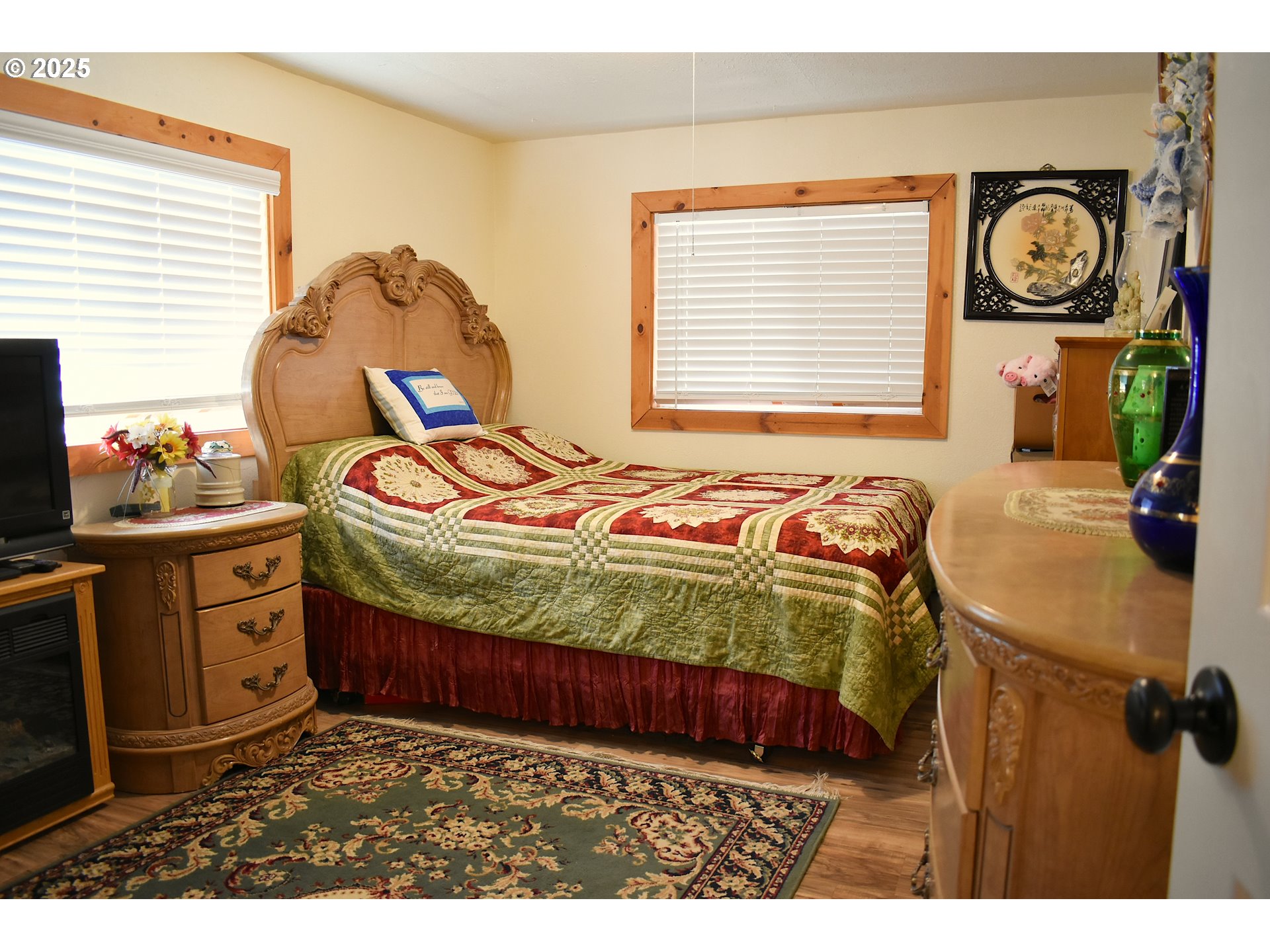 40300 Kahler Basin Road Spray, OR 97874 - Photo 12 of 26 a bedroom with a bed and a window