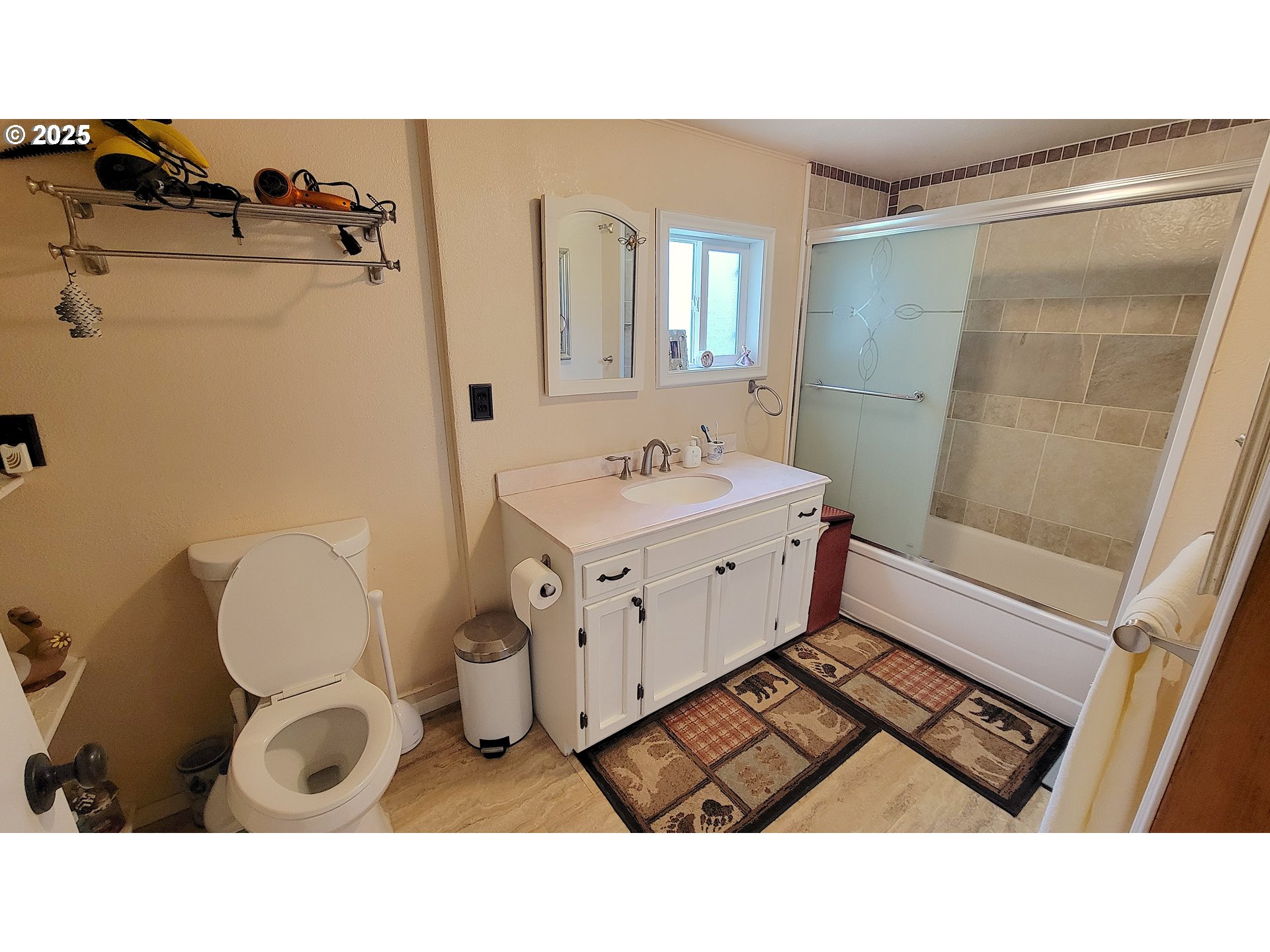 40300 Kahler Basin Road Spray, OR 97874 - Photo 13 of 26 a bathroom with a sink mirror vanity and toilet