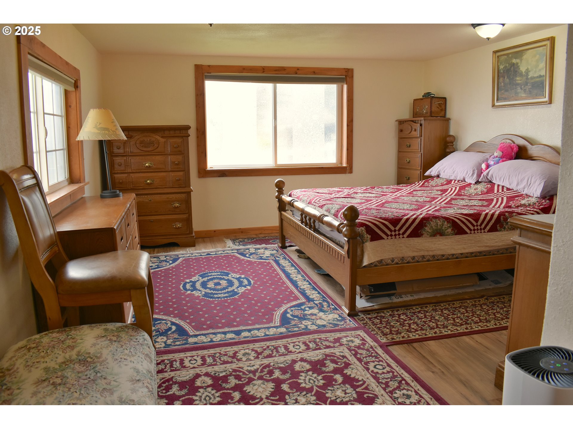 40300 Kahler Basin Road Spray, OR 97874 - Photo 16 of 26 a bedroom with a bed and wooden floor